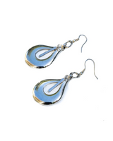 Bold open teardrop earrings with an antique silver finish, featuring a sleek zamak design and long oval hoops.