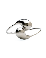 Adjustable stainless steel bracelet with large drops, featuring a sleek cuff design. Suitable for wrist or arm wear.
