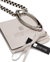 Chunky stainless steel box chain necklace with oversized oval spring snap carabiner, includes suede gift pouch.