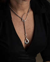 Classy stainless steel ball chain necklace with a drop pendant, featuring a sleek silver hook design.