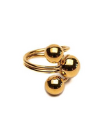 Adjustable stainless steel ring featuring three shiny gold spheres, creating a modern, edgy look.