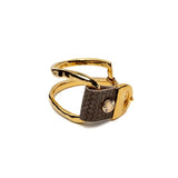 Gold plated chunky bracelet with textured brown leather detail, featuring a unique design and adjustable fit.