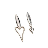 Asymmetric silver heart earrings featuring a long heart and a smaller heart charm, ideal for a unique stylish look.