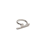 A modern gold or silver statement ring, an edgy-chic stainless steel ring, asymmetrical minimalistic art worn on your finger