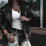 Double wrap bracelet with multiple snake chains, leather and unique buckle with coin pendant for a statement look