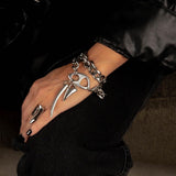 Statement stainless steel chain wrap bracelet with oversized pendant teeth