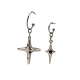 Silver hoop earring set featuring large and small dangle cross charms, with black enamel accents and stainless steel hoops.