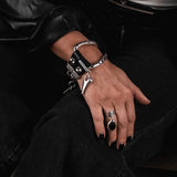 Striking metal and leather bracelet, unisex edgy and unique jewelry