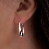 Classy Teardrop Earrings in polished silver plated zinc alloy with a 2 inch drop and sleek teardrop shape