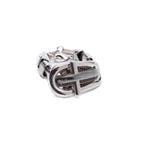 Multi-strand metal chain bracelet features a chunky buckle closure, combining sleek metallic links with a bold design.