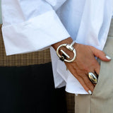 Standout black leather and horsebit metal, Equestrian cuff bracelet, Unode50 style bracelet, Chunky brutalist jewelry