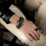 Bold textured disc bracelet with leather and strass, rock style statement bracelet for a strong look