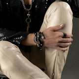 Bold textured disc bracelet with leather and strass, rock style statement bracelet for a strong look