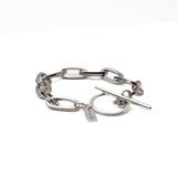 Chunky silver chain anklet featuring a T-clasp, with an antique finish and adjustable links for a bold look.