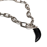 Brutalist necklace with gemstone tooth, edgy agate pendant hangs from chunky steel chain with u bolt shackle