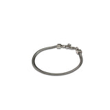 Silver snake chain anklet featuring a flexible design with a smooth finish and clasp closure, ideal for a chic look.