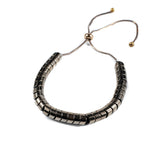 Bronze Hematite Bracelet featuring a metallic finish with a slider closure for adjustable fit. Suitable for stacking.