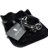 Black leather wrap bracelet featuring iron chains and metal elements, with a buckle for adjustable fit.