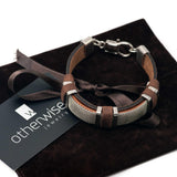 Men’s bracelet with flat silver chain on tan leather