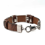 Men’s bracelet with flat silver chain on tan leather
