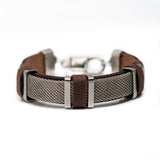 Men’s bracelet with flat silver chain on tan leather