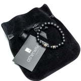 Black glass beaded bracelet with metal details for men