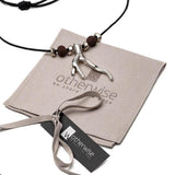 Men's adjustable black cord necklace featuring a metal wishbone pendant and brown lava stones.