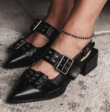 Anklet featuring faceted cut glass beads in silver night color, worn with stylish black heeled shoes.
