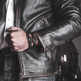 Men's matt black silicon bracelet with gun metal buckle for an every day strong look, rubber cuff and toggle buckle
