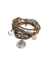 Suede boho bracelet featuring four strands with silver-plated cube beads and charms, adjustable with an extension chain.