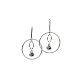 Elegant loop earrings featuring a silver night Austrian crystal pendant, with a sleek electro rhodium plated brass design.