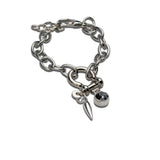 Rock style silver bracelet featuring a stainless steel chain, shackle U bolt, grey Swarovski crystal, and teardrop pendant.
