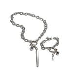 Adjustable rock style silver bracelet featuring a stainless steel chain, Swarovski crystal charm, and teardrop bar pendant.