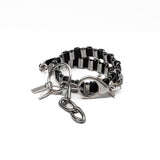 Edgy stainless steel bracelet with black leather in chain and oversized buckle, chunky wrap rocker cuff