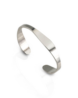 Silver-plated cuff bangle featuring an irregular geometric design, adjustable fit for comfort, and a sleek finish.