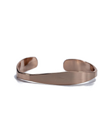 Rose gold cuff bangle with a smooth, flexible design. Stackable style suitable for various wrist sizes.