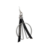 Funky earrings made of black leather with strass and silver-plated elements, different earring on each ear worn together or individually