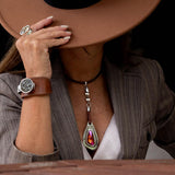 Astral pink crystal pendant necklace with bronze leather choker, silver-plated chain, and silver-coated Zamak metal