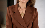 Classy gold-plated brass necklace with metallic motif and baroque pearl