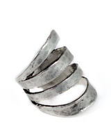 Chunky, hammered silver-plated metal ring with a spiral design, adjustable fit made from molded brass bronze.