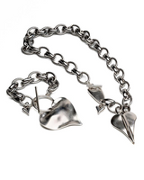 Chunky stainless steel heart pendant necklace with a matching bracelet, featuring a textured oval link chain and T-clasp.