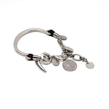 Silver charm bracelet, leather and metal bracelet with coins