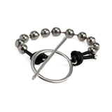 Bracelet with ball chain, leather and ring and bar closure made in the Unode50 style