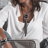 Studded leather choker necklace with black leather, silver-tone Zamak center, metal studs, and adjustable chain
