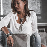 Rock style chocker necklace made of a sturdy metal design and black leather with studs