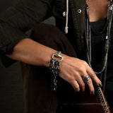 Boho rings set features four adjustable silver rings with various designs including floral engravings and Hamsa hand.