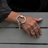 Standout black leather and horsebit metal made in the Uno de 50 style, equestrian cuff bracelet