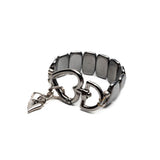 Chunky hematite gemstone cuff bracelet featuring a gunmetal heart buckle, adjustable size with a stylish metallic finish.
