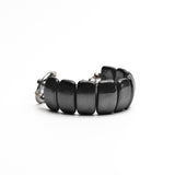 Chunky black hematite gemstone cuff bracelet featuring a gunmetal heart buckle, adjustable size with sleek design.