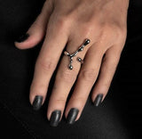 Adjustable irregular funky bar ring in silver plated copper, featuring a unique design with varying shapes and textures.